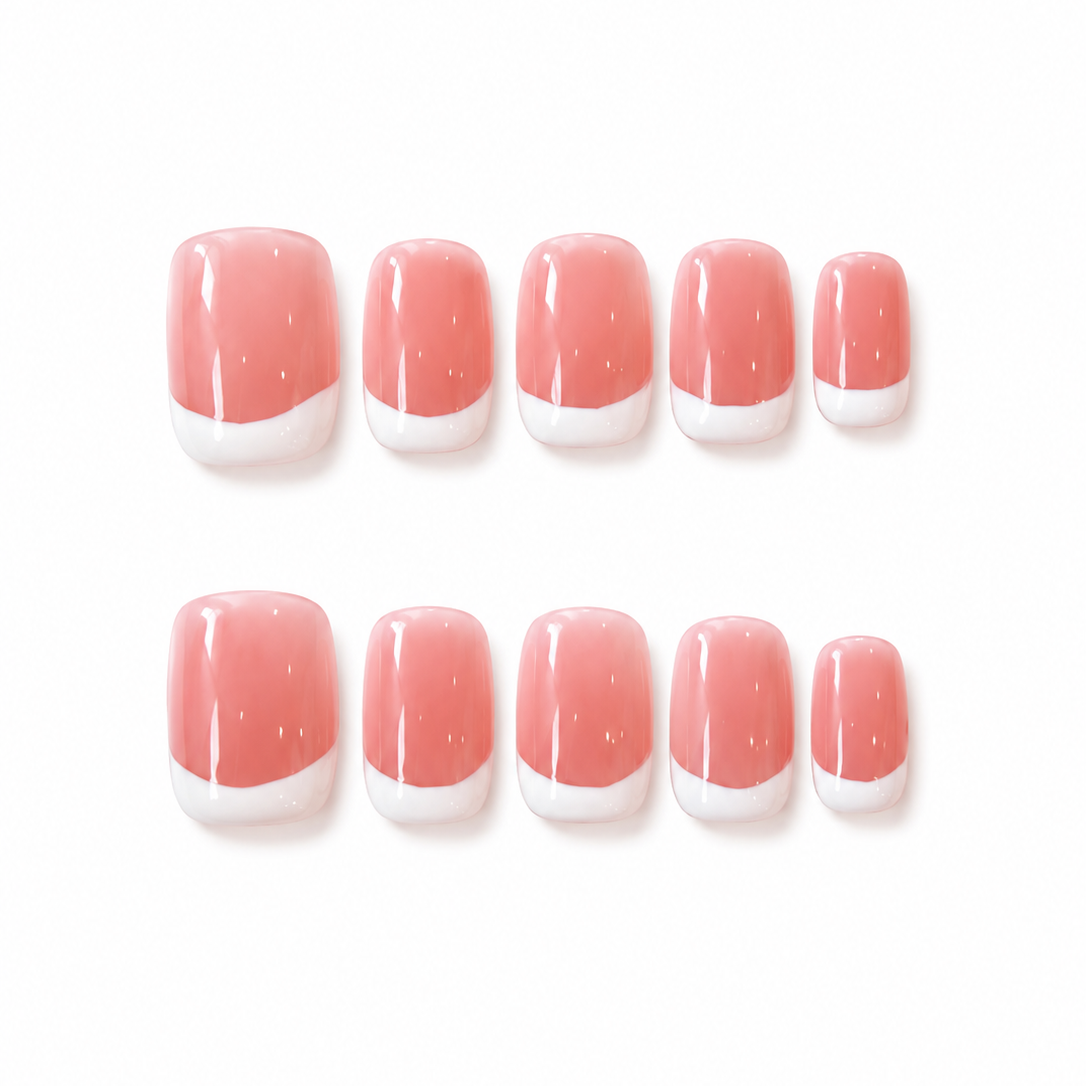 Set of pink nail wraps with white tips on a white background
