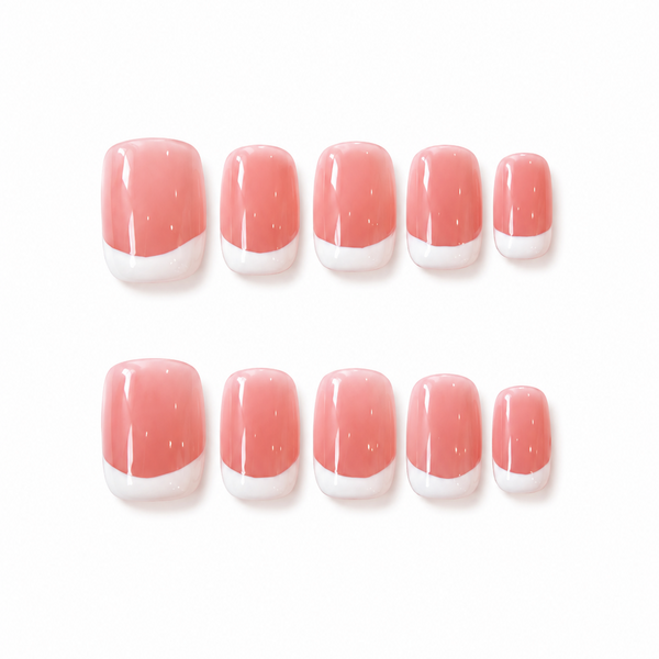 Set of pink nail wraps with white tips on a white background